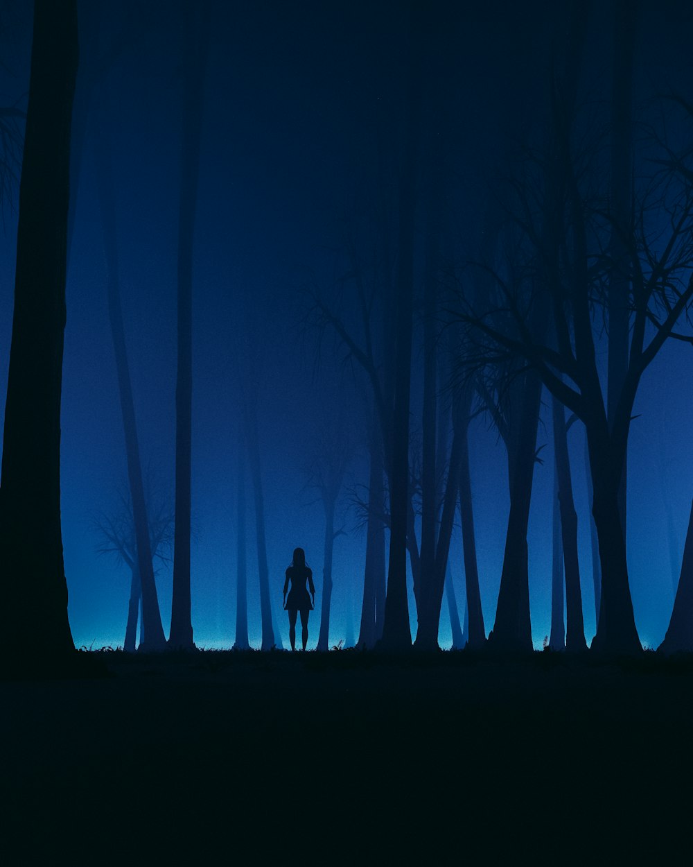 a person standing in a forest