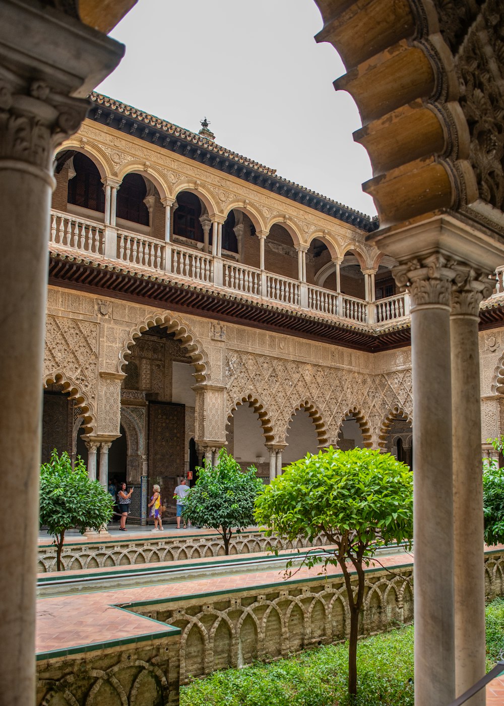 a building with a courtyard and trees