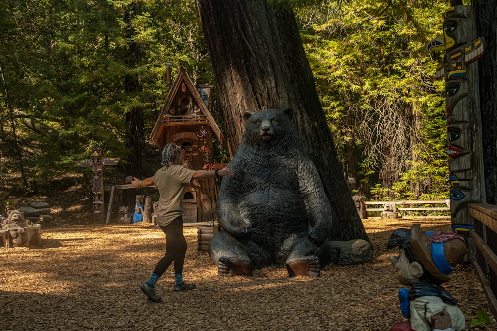 a bear statue in a zoo exhibit