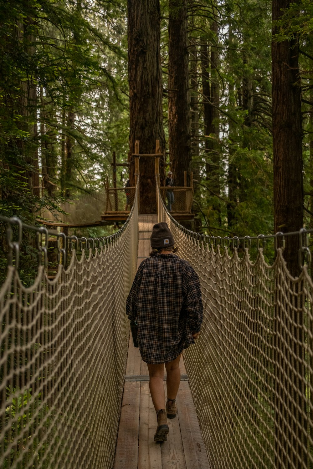 a person walking on a bridge