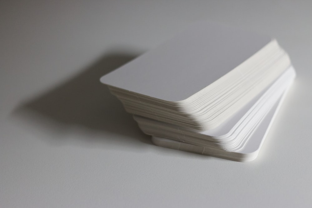 a white paper on a white surface