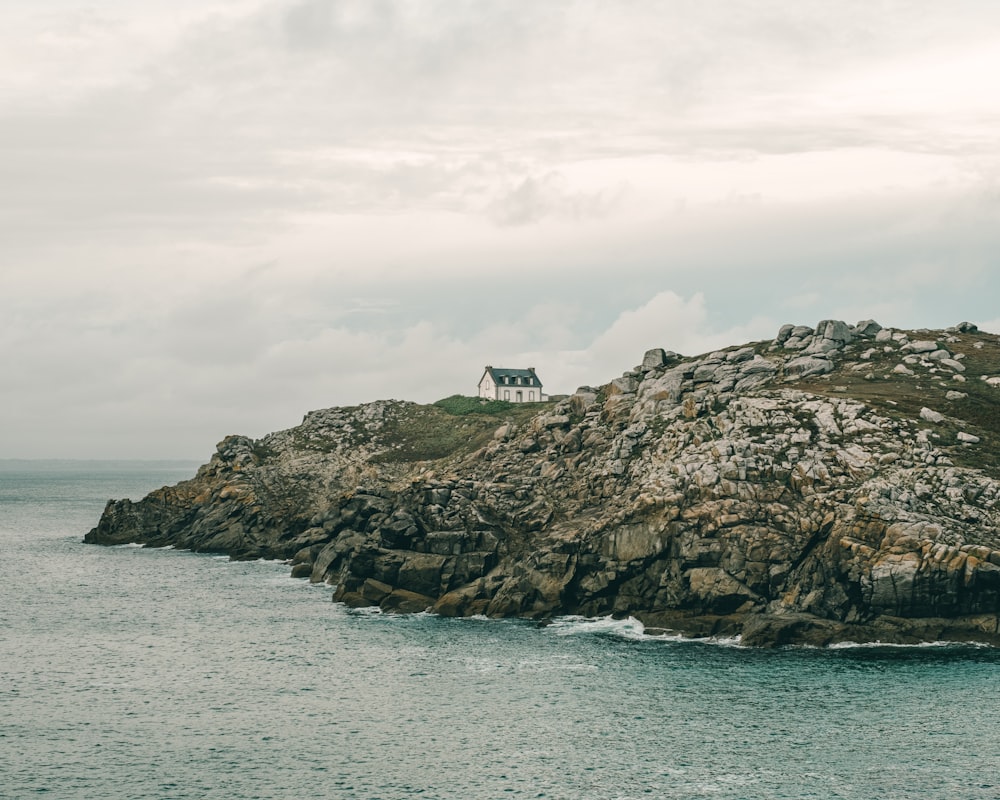 a house on a rocky island