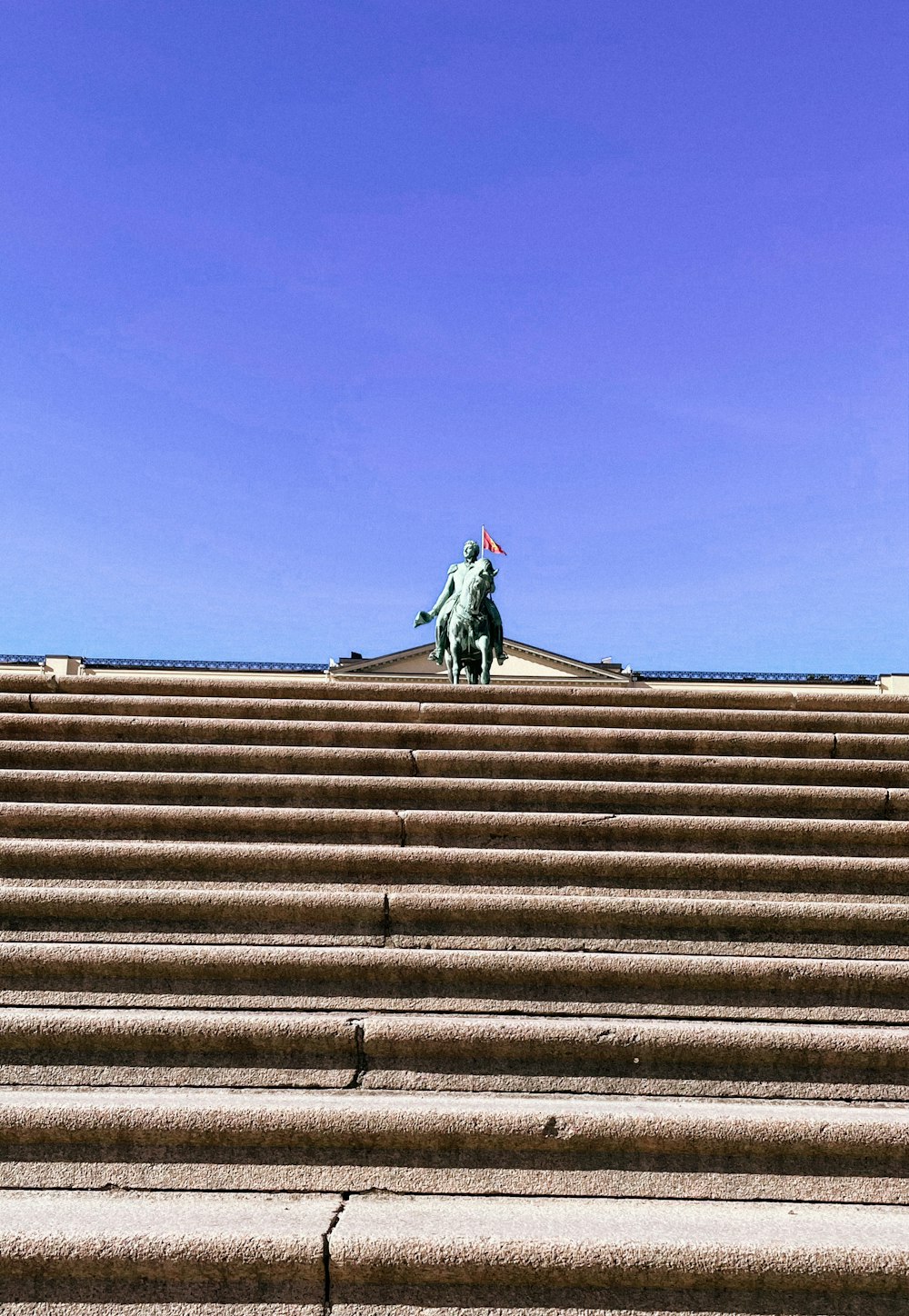 a statue on a roof