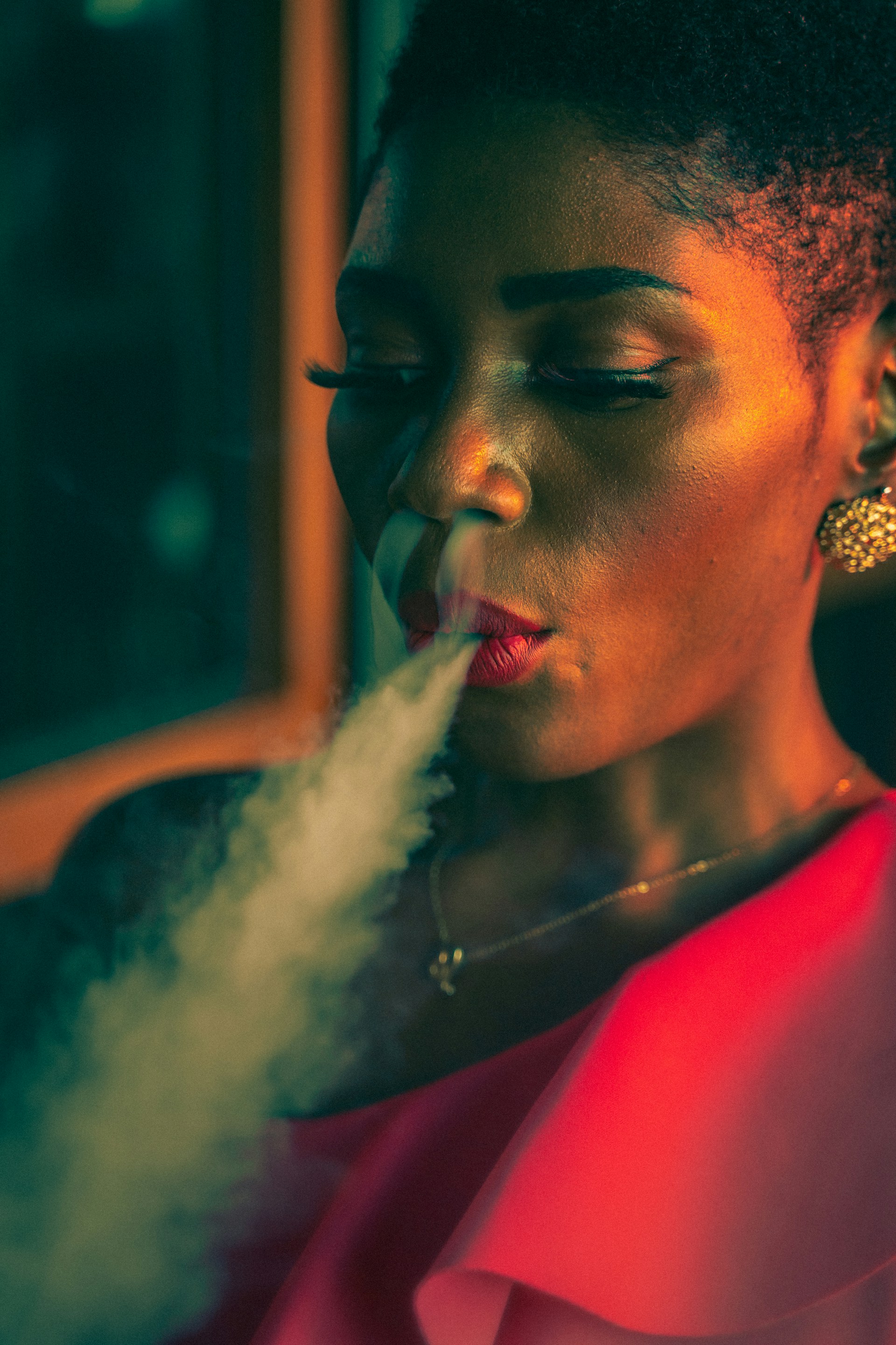 a man smoking a cigarette