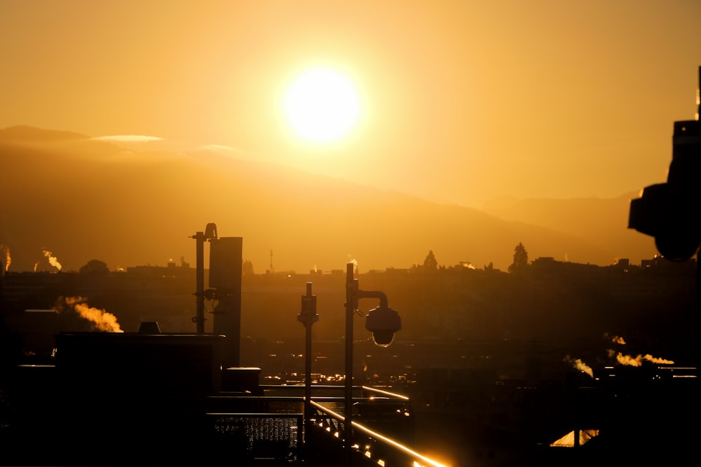 a sunset over a city