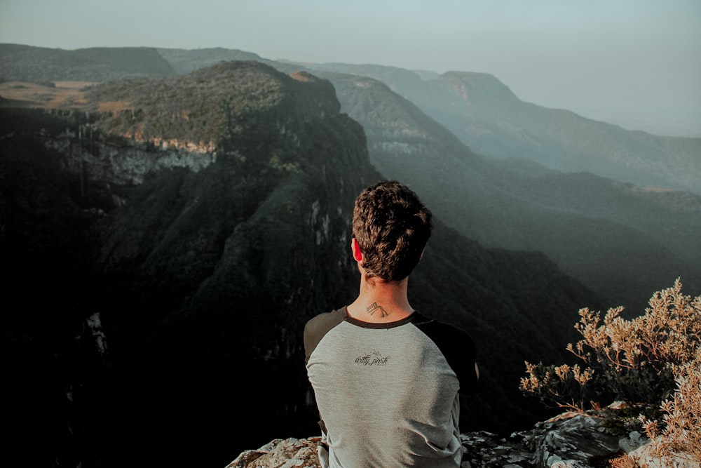 a man standing on a mountain