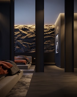 a room with a view of a mountain and a lake
