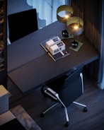 Modern workspace featuring sleek cabinetry and ergonomic chair.