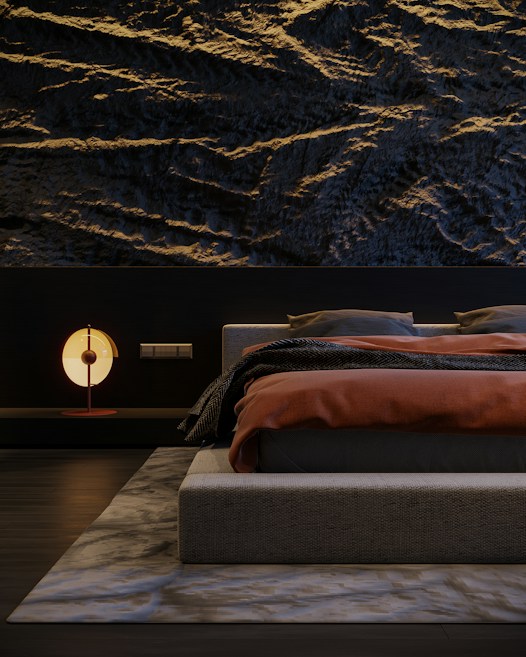 A modern bedroom featuring a textured dark wall with wave-like patterns. The bed has a low-profile design, dressed in dark gray bedding with a burnt orange blanket. A contemporary round lamp with a soft glow sits on a sleek bedside table. The room is minimalistic, with a sense of balance and harmony.