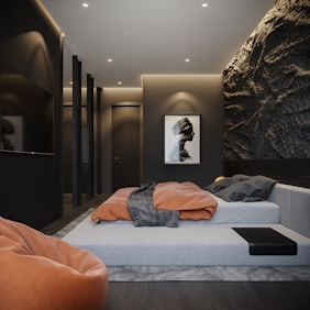 a bed with a poster on the wall