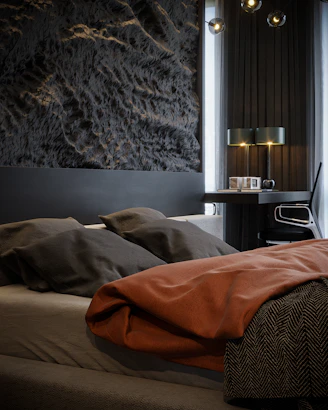 a bed with a blanket on it