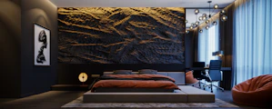 a room with a bed and chairs