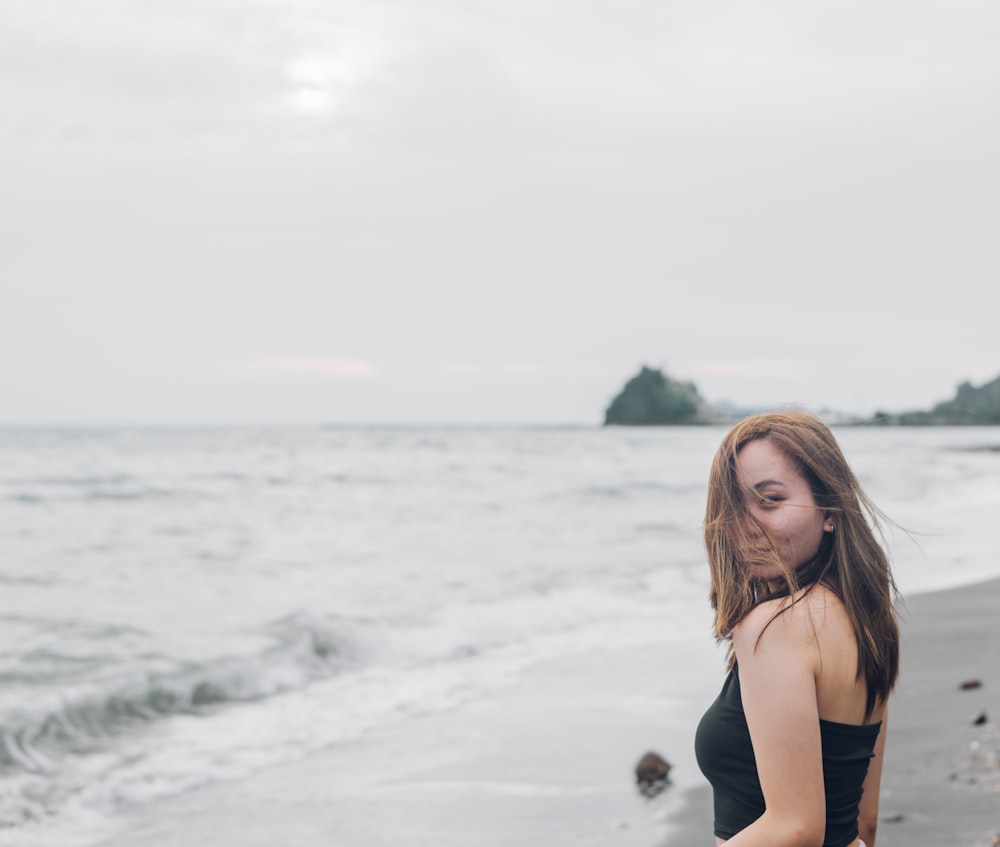 a woman standing in the water