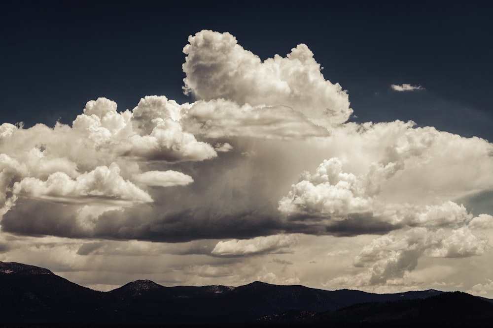 a large white cloud in the sky