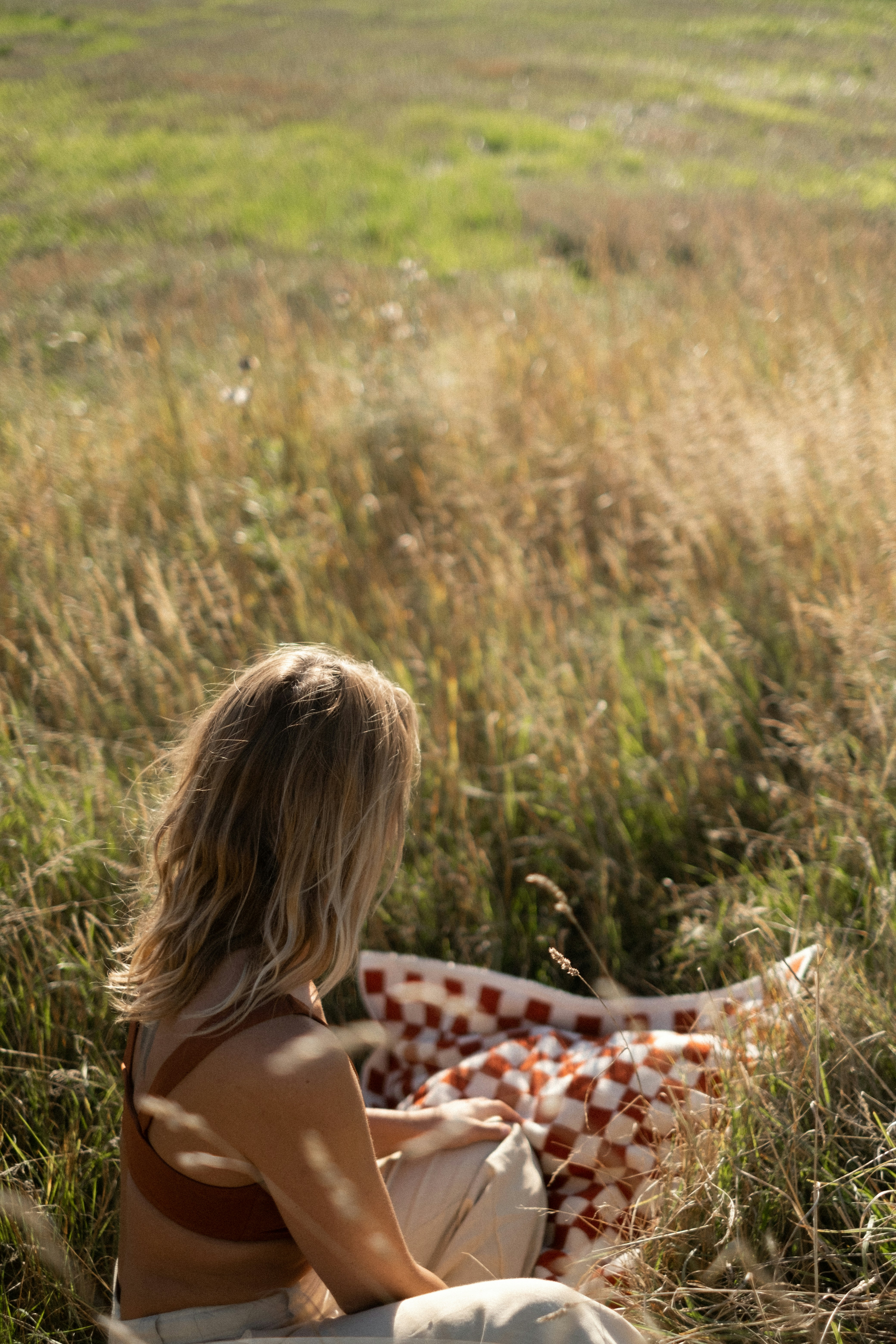 a person sitting in a field