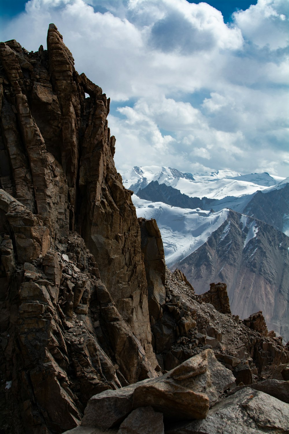 a rocky mountain with snow