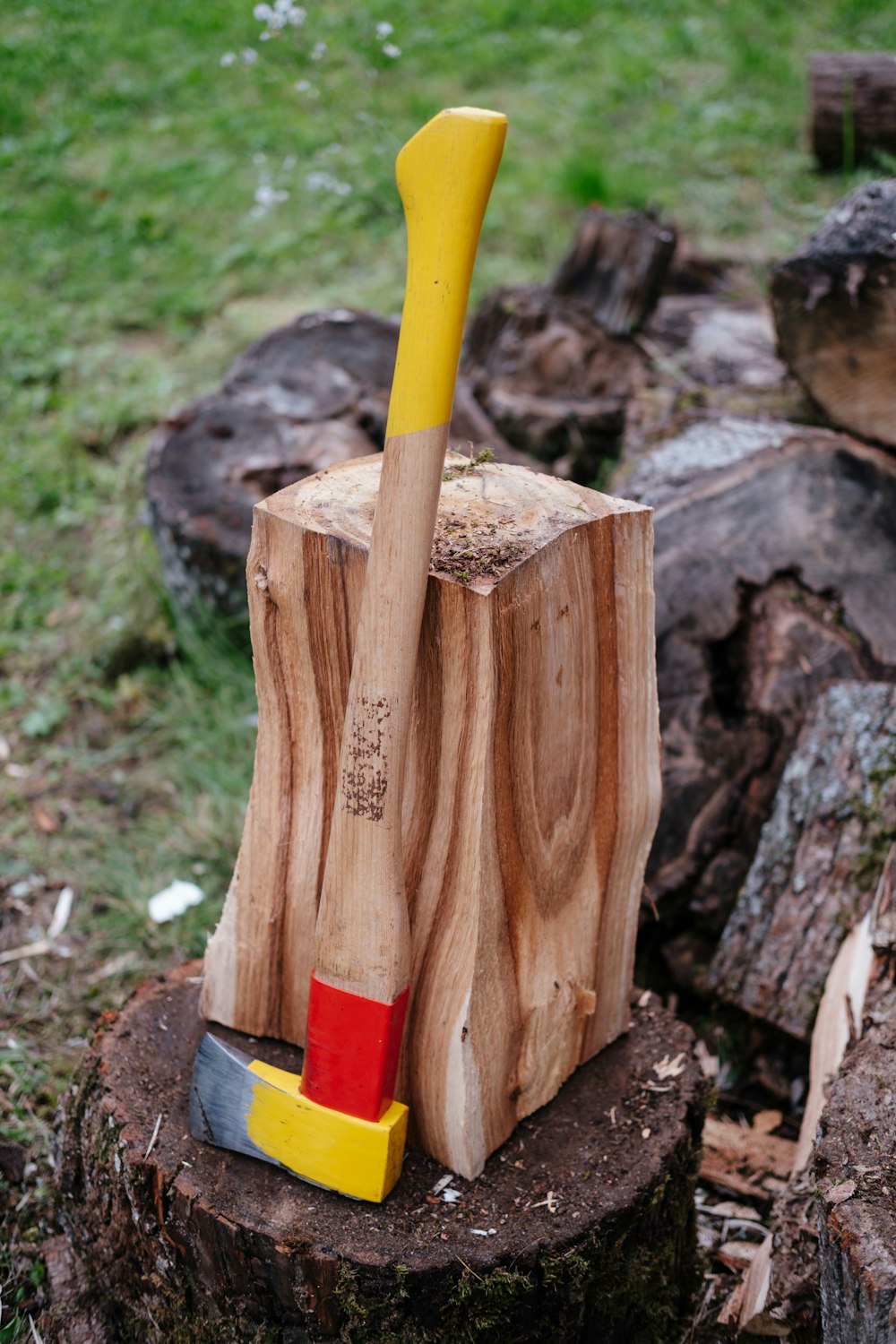 a wooden shovel in a stump