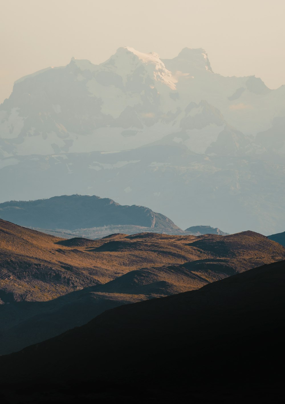 a mountain range with a valley below