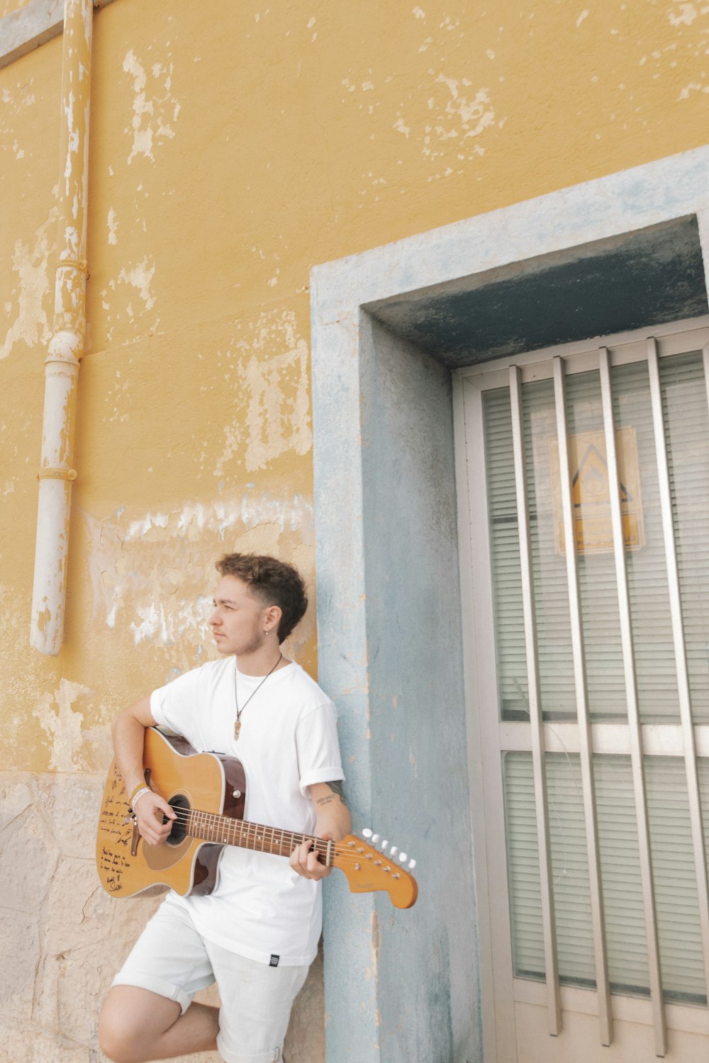 a man playing a guitar