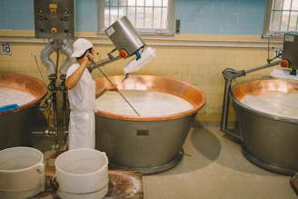 a person washing a sink