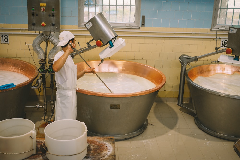 a person washing a sink