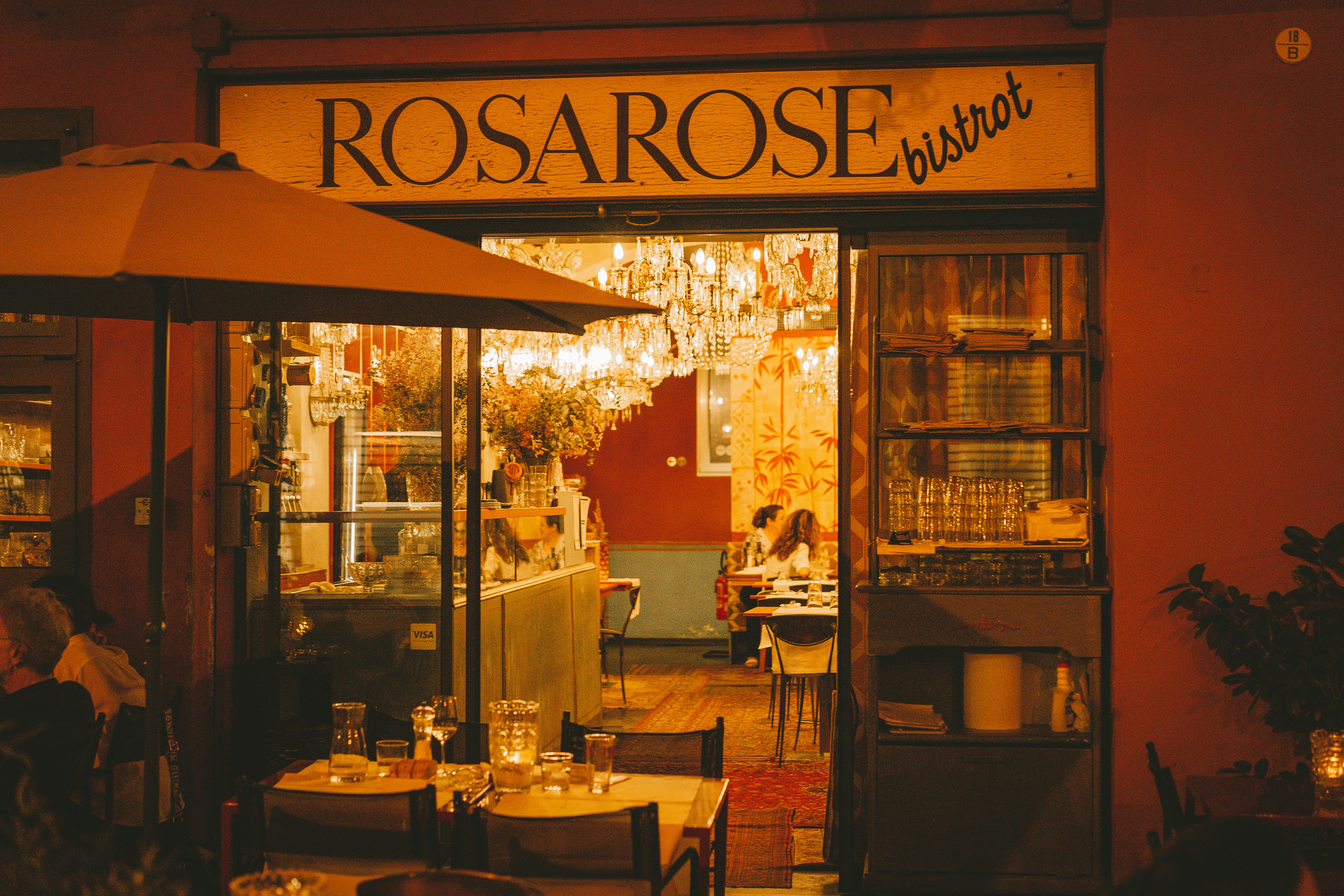 a restaurant with tables and chairs