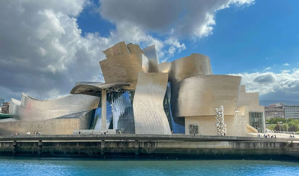 The titanium-clad Guggenheim Museum along the Nervión River in Bilbao, Spain