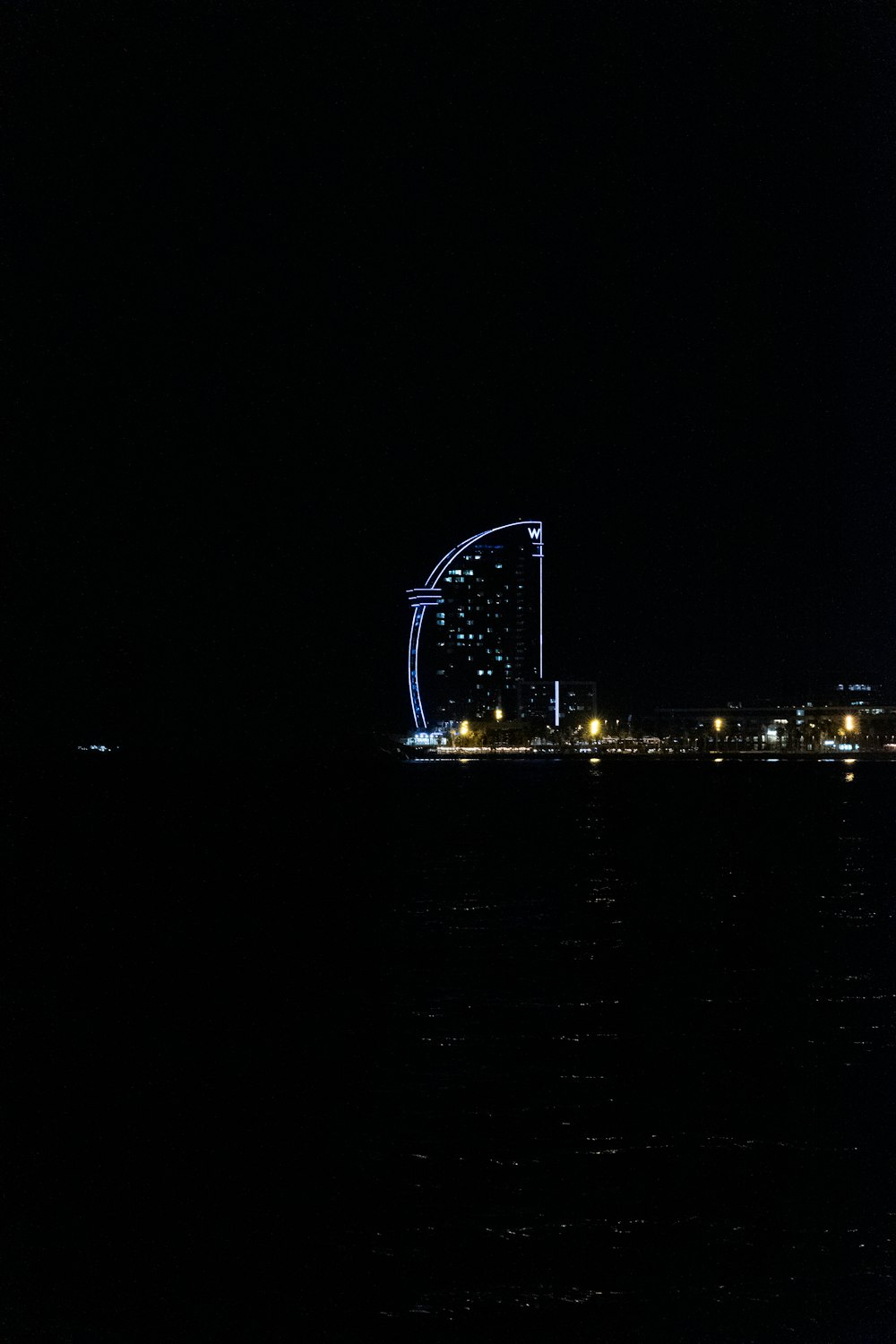 a large lighted wheel at night