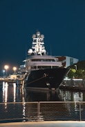 a large boat docked at a pier