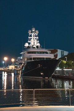 a large boat docked at a pier