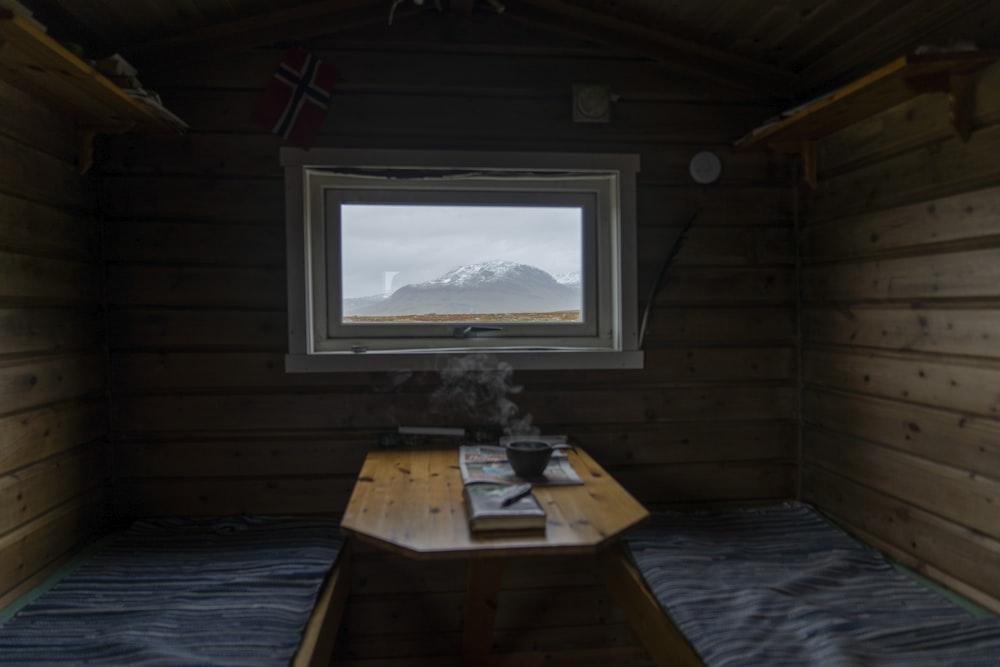 a room with a table and a tv in it