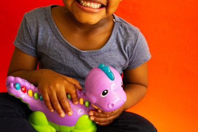 a person holding a toy