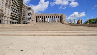 a stone walkway leading to a building