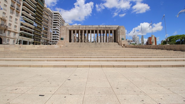 a stone walkway leading to a building