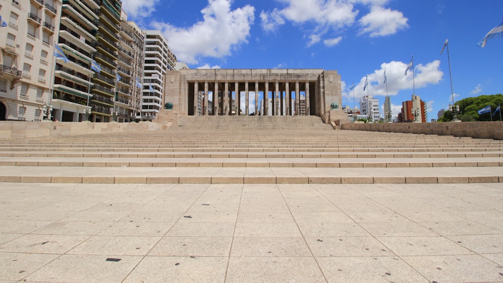 a stone walkway leading to a building