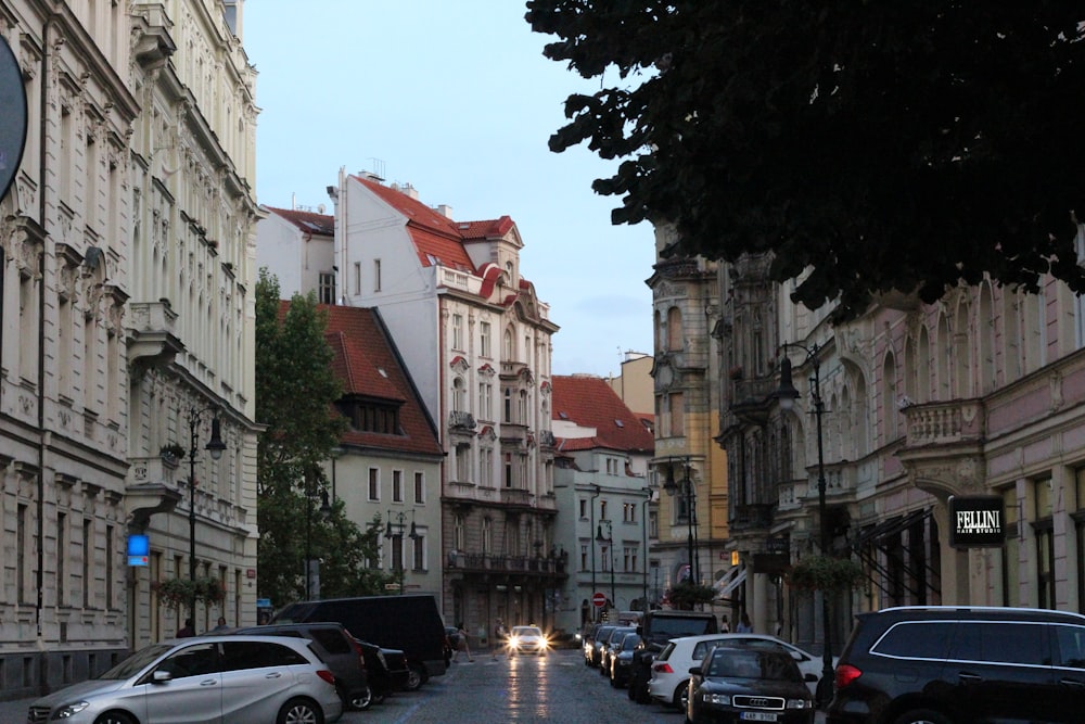 a street with cars and buildings on either side of it