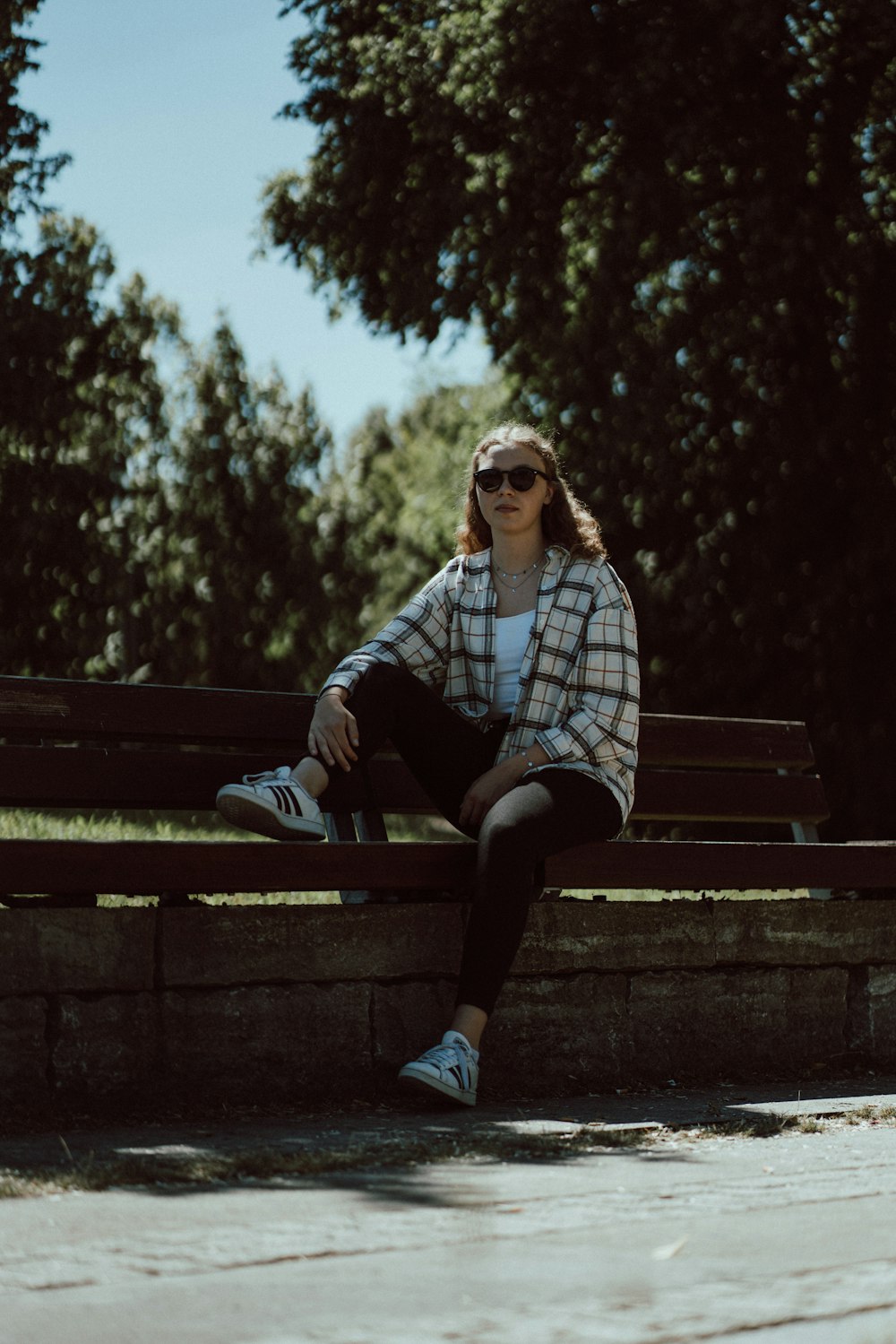 a person sitting on a bench