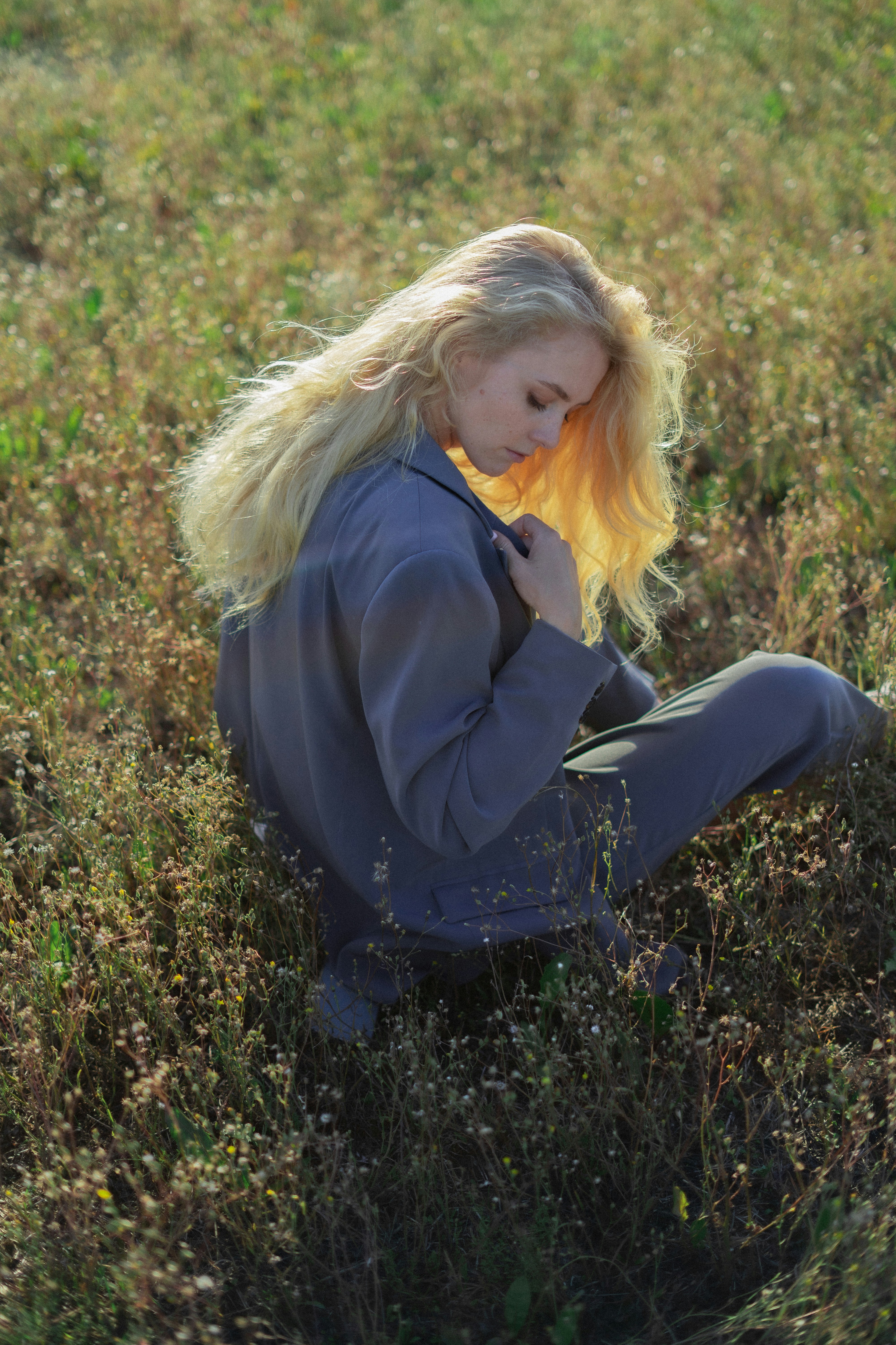 a person sitting in a field