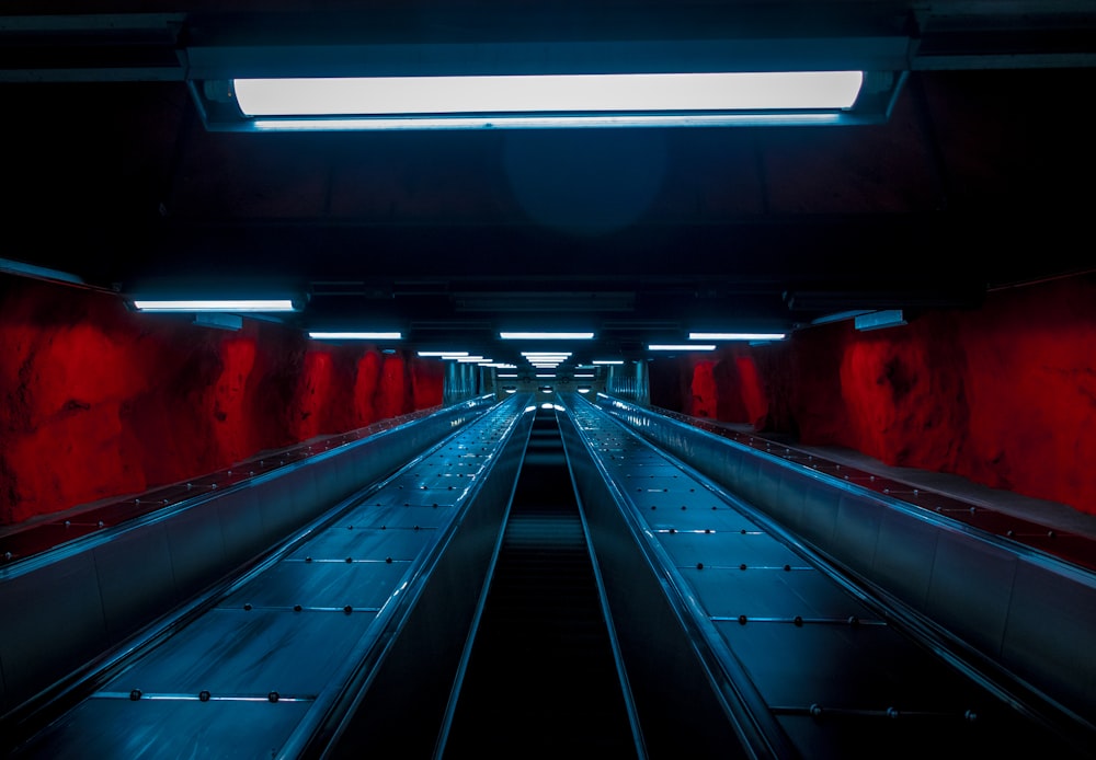 a tunnel with red lights