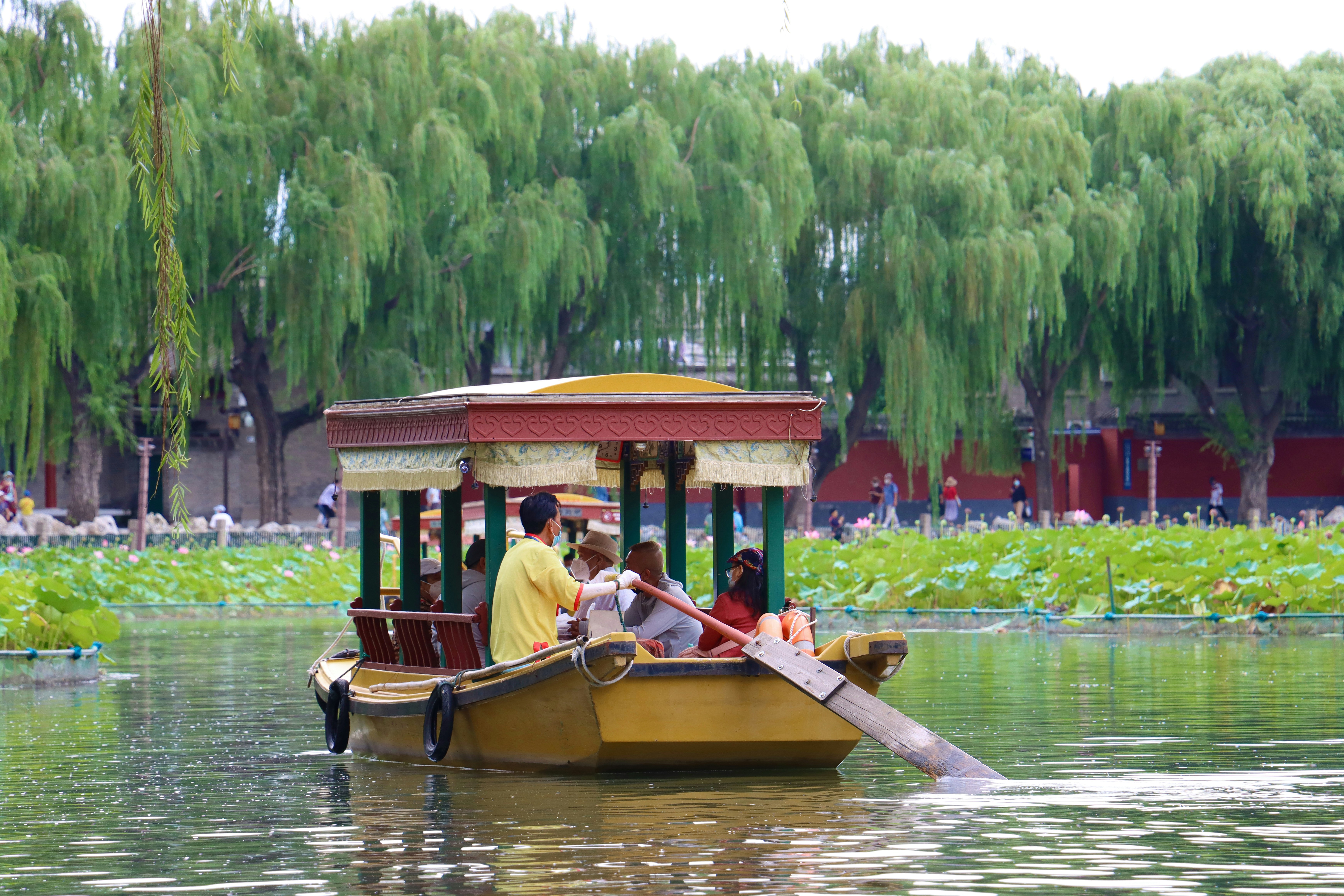a boat full of people on a river