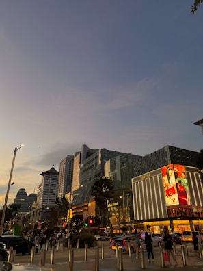 Evening lights illuminating a popular shopping street in downtown Durgapur