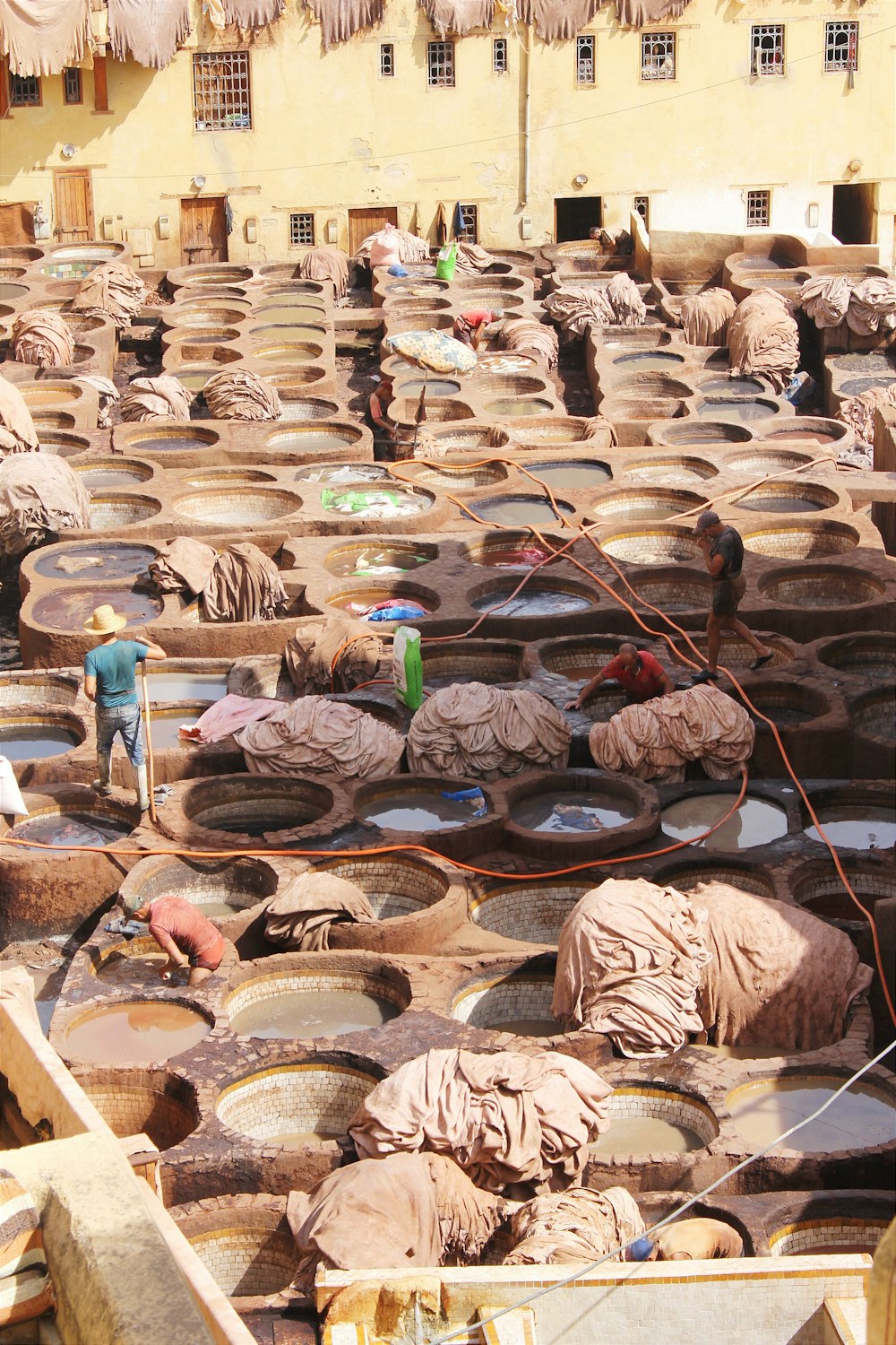 a group of people working in a factory