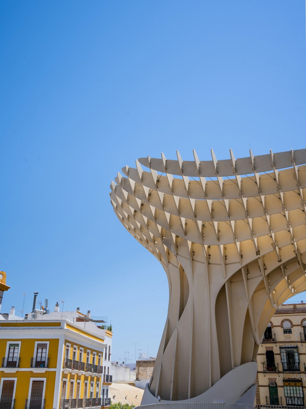 a building with a curved roof