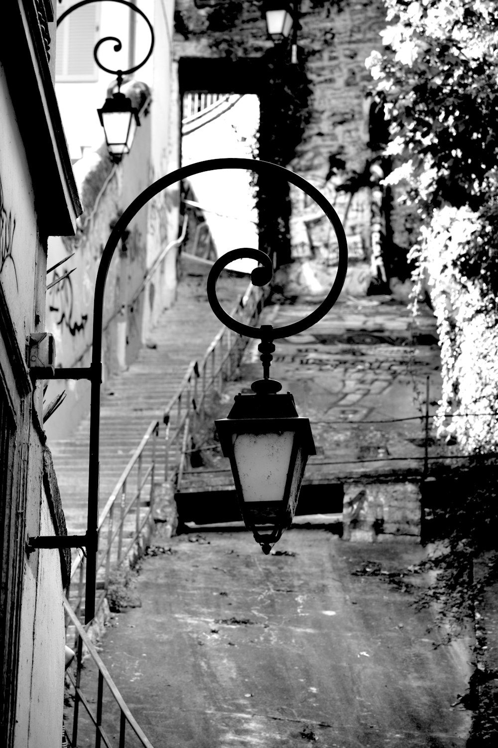 a lamp on a sidewalk