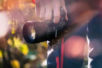a person holding a camera