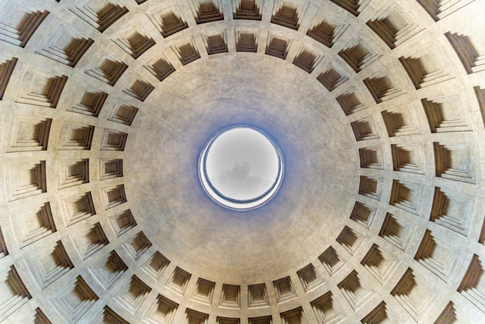 a circular ceiling with a circular window