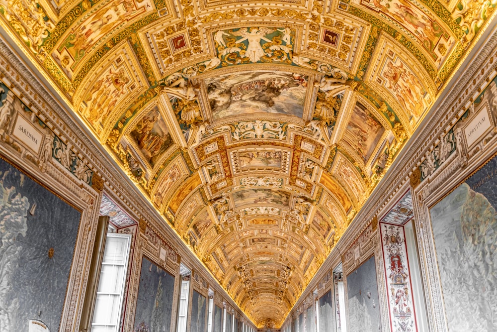 a ceiling with paintings on it