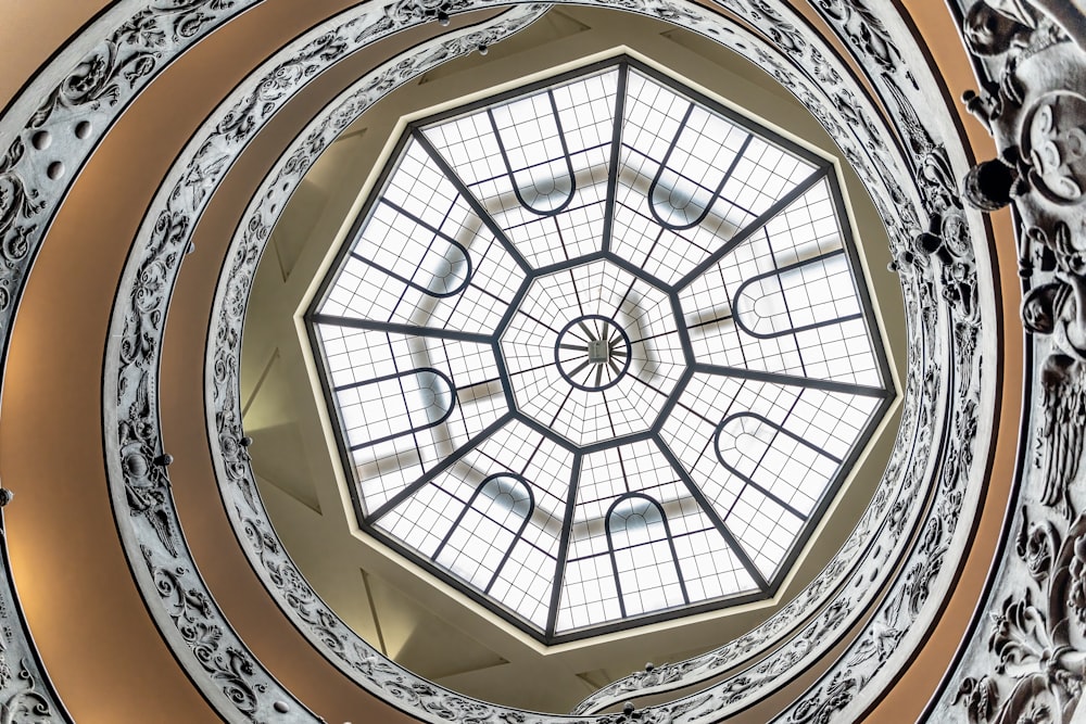 a circular ceiling with a design