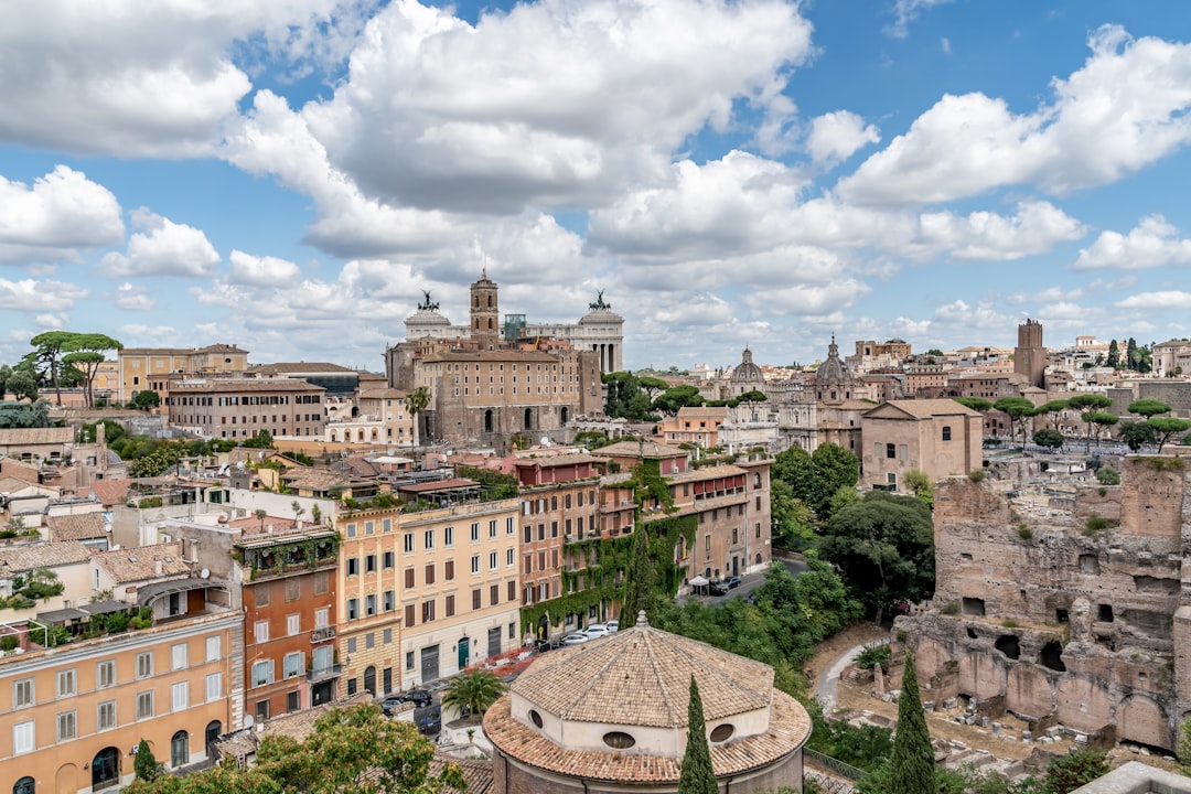 a city with a hill and buildings,