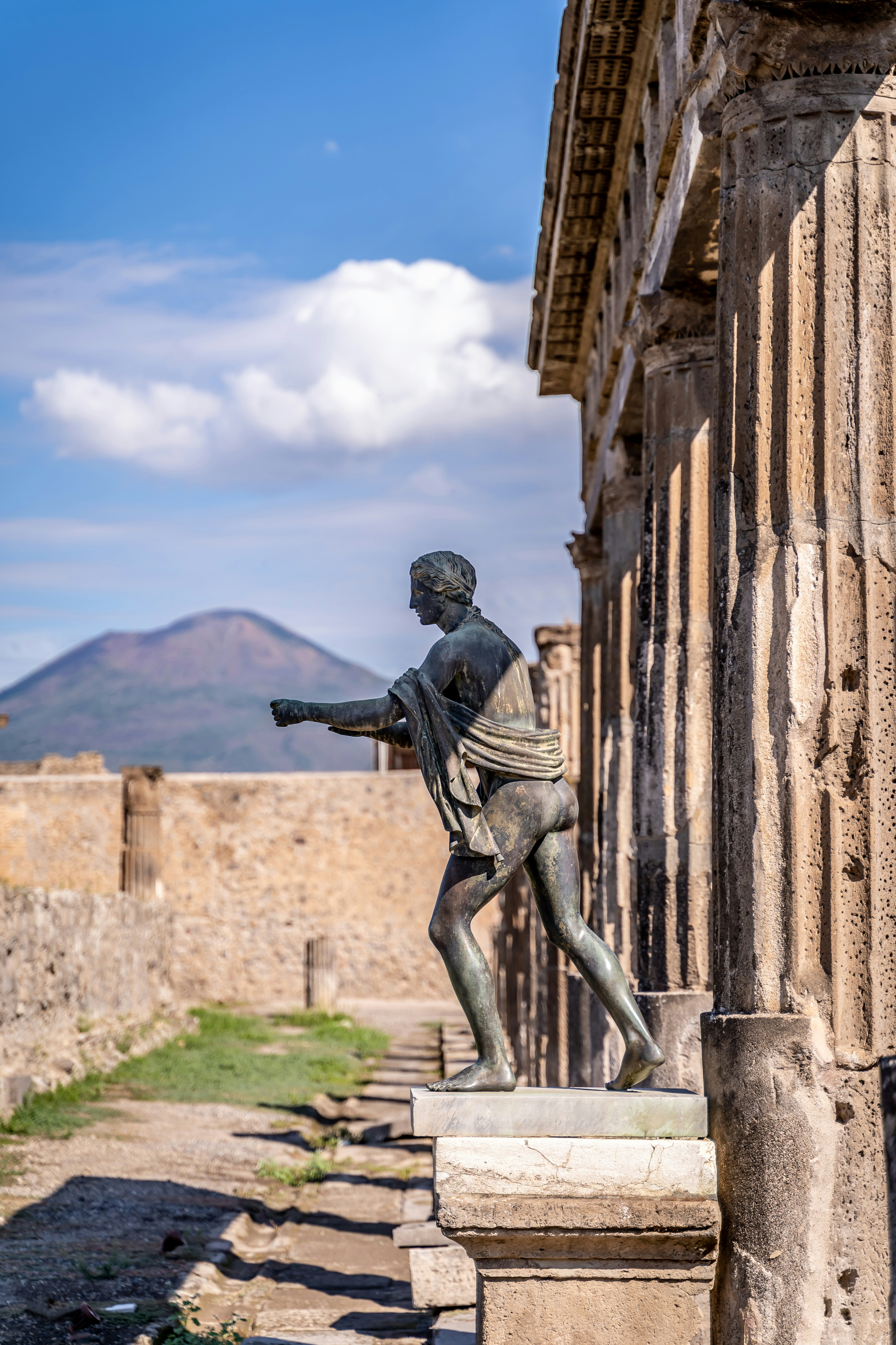 a statue of a person holding a gun